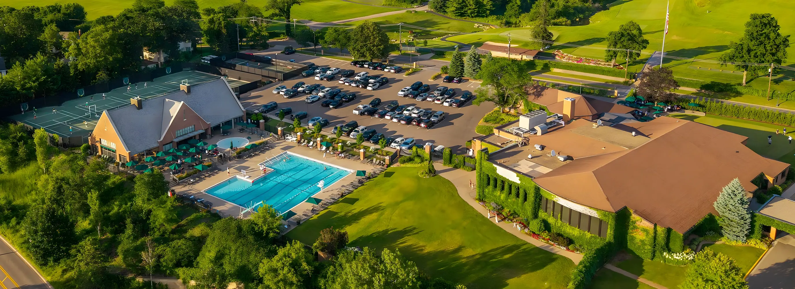aerial-country-club-with-pool-and-tennis-courts