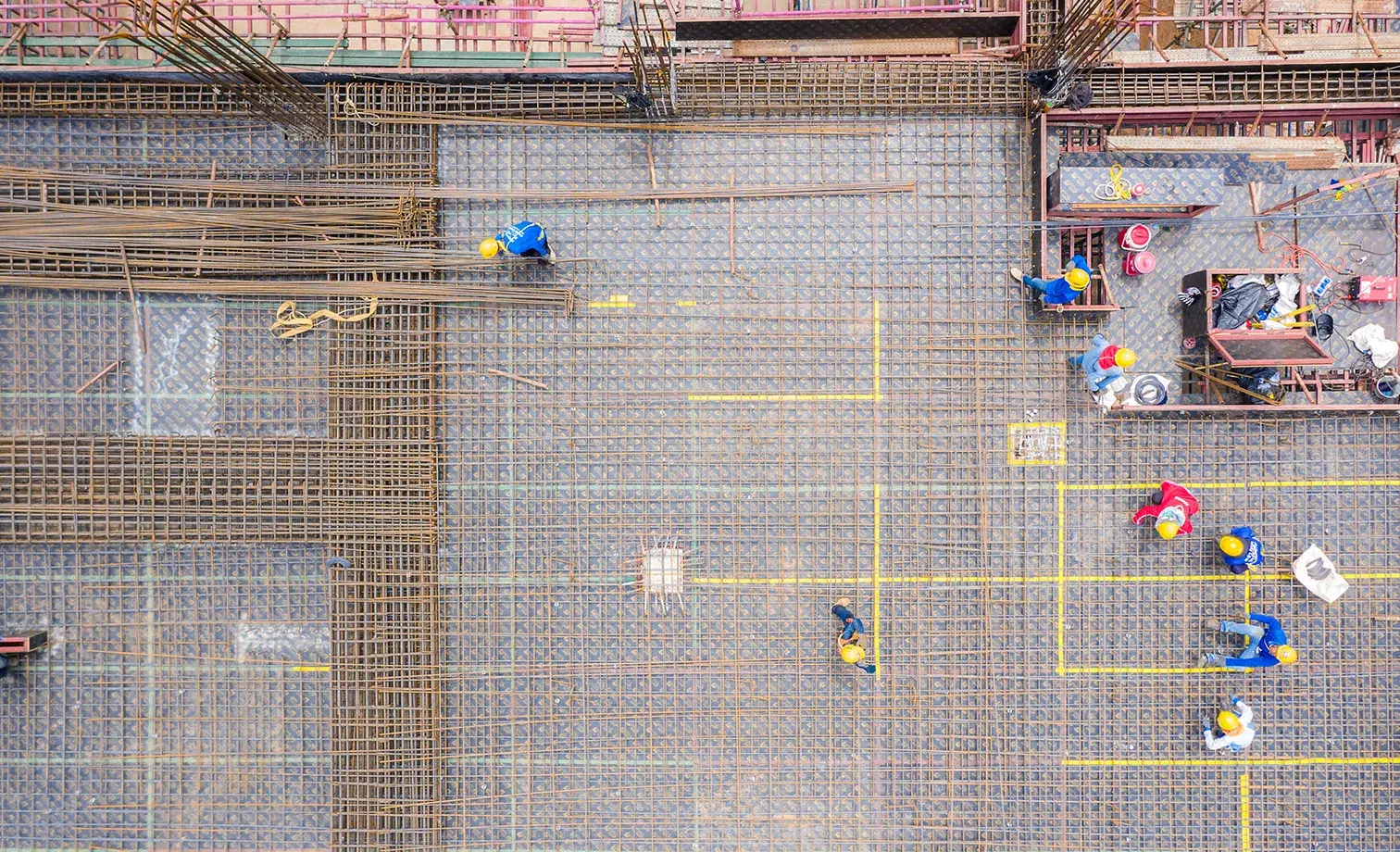 aerial-footage-rebar-foundation-construction-workers
