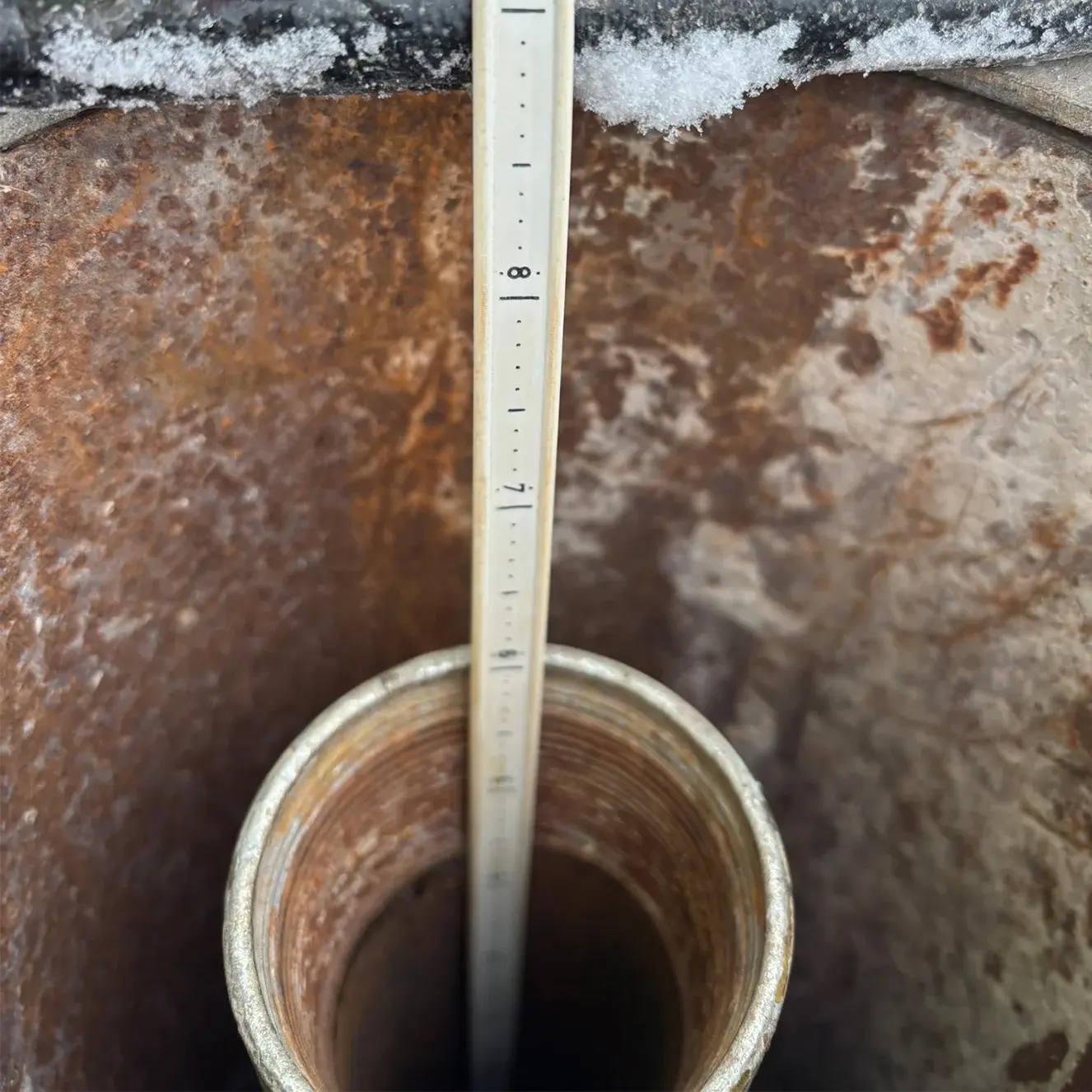 groundwater-monitoring-well-measurement-pipe-winter