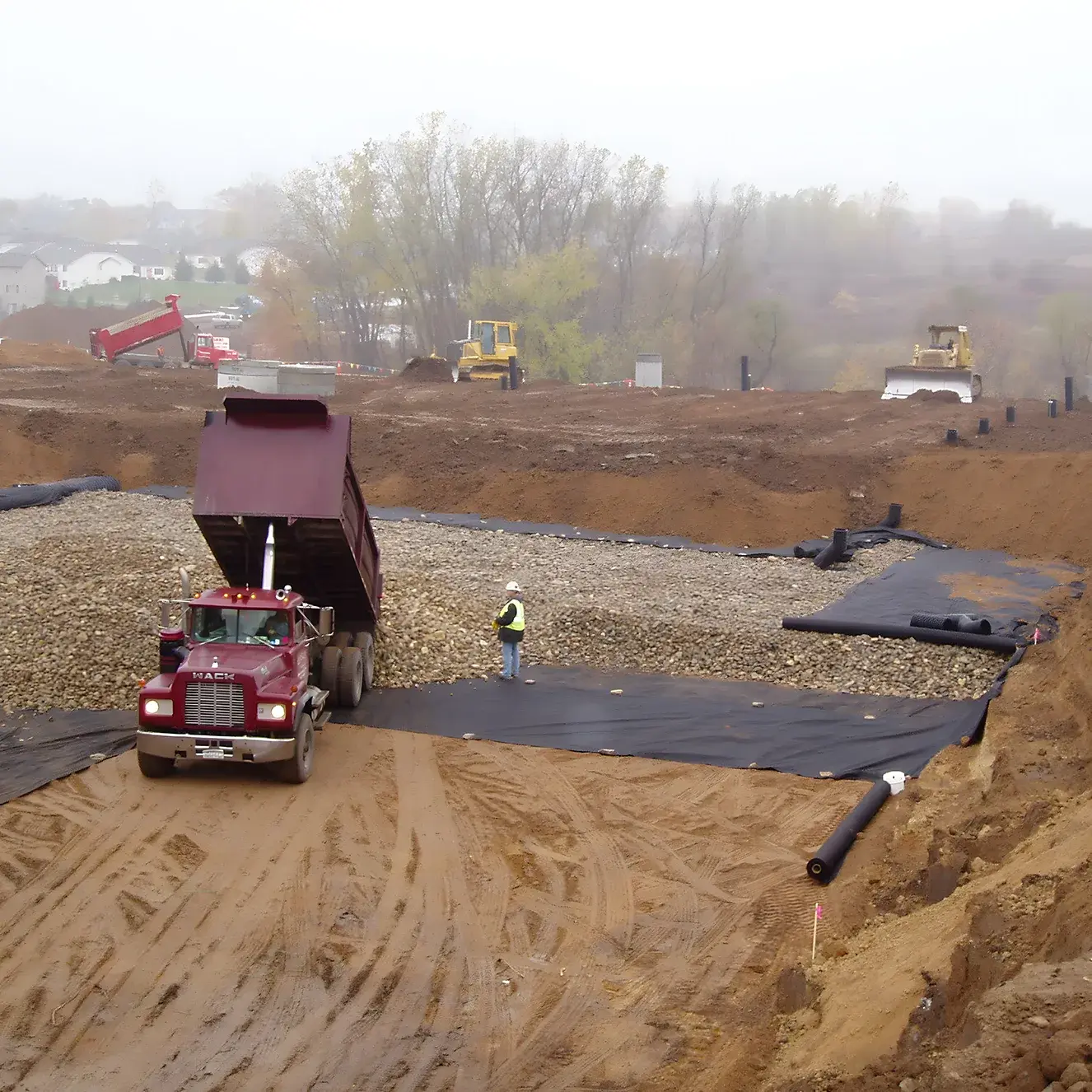 stormwater-pond-construction-site-gravel-installation